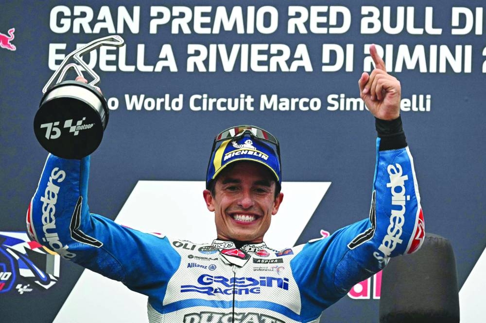Gresini Racing MotoGP’s Spanish rider Marc Marquez celebrates on the podium after winning the San Marino MotoGP at the Misano World Circuit Marco-Simoncelli in Misano Adriatico on Sunday. (AFP)