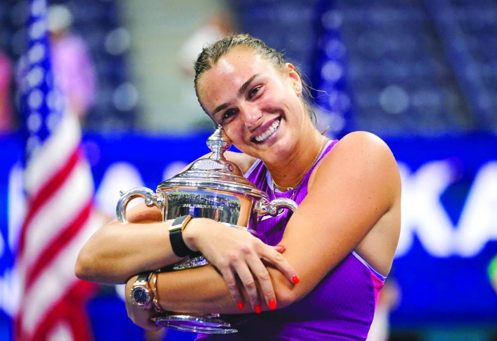 
Belarus’s Aryna Sabalenka holds the trophy after defeating USA’s Jessica Pegula in the US Open final at the USTA Billie Jean King National Tennis Center in New York, on Saturday. (AFP) 