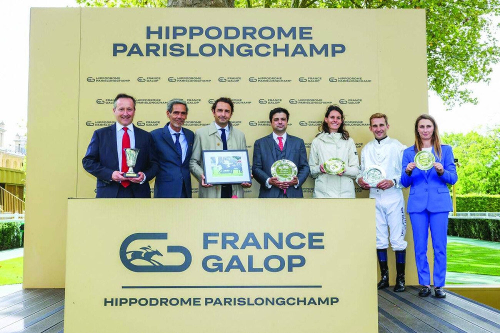 Connections of Houquetot celebrate after the colt won the Gr.3 Prix La Rochette at ParisLongchamp on Sunday.