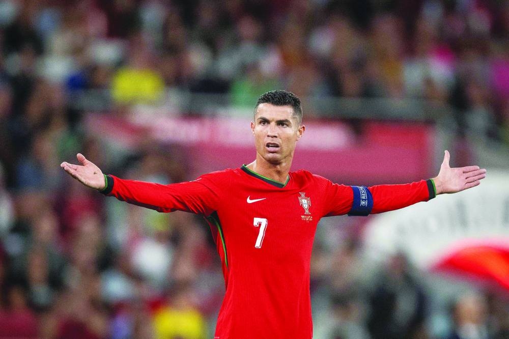 
Portugal’s Cristiano Ronaldo reacts during the UEFA Nations League match against Scotland at Luz stadium in Lisbon. (AFP) 