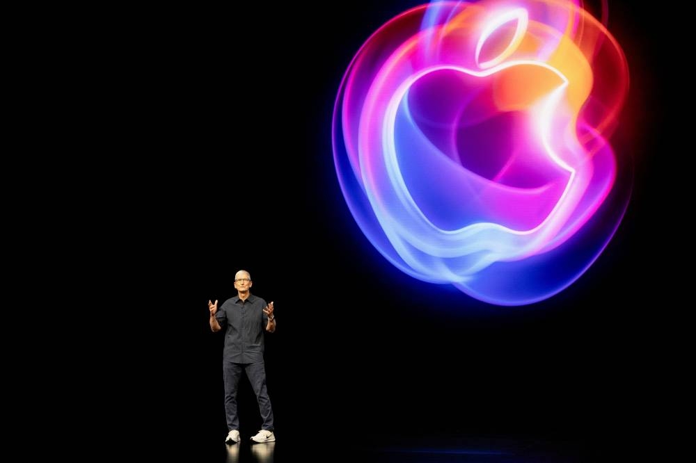 CEO of Apple Tim Cook gives a presentation as Apple holds an event at the Steve Jobs Theater on its campus in Cupertino, California on Monday. Apple announced a new iPhone built for generative artificial intelligence as it seeks to boost sales and show it is keeping up in the technology race.