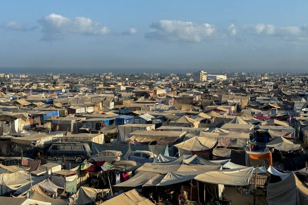 Displaced Palestinians shelter in a tent camp at the Al-Mawasi area in Khan Younis, in the southern Gaza Strip, on Tuesday. REUTERS