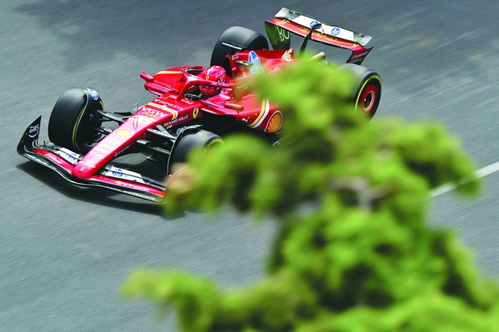 Ferrari’s Monegasque driver Charles Leclerc steers his car during the first practice session ahead of the Azerbaijan Grand Prix at the Baku City Circuit on Friday. (AFP)