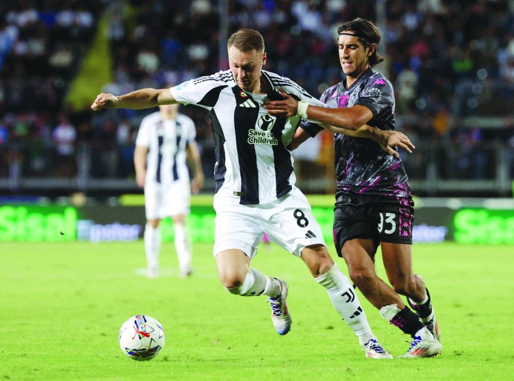 Teun Koopmeiners of Juventus is seen battling for ball possession against Empoli’s Youssef Maleh during a Serie A match at Stadio Carlo Castellani, Empoli, Italy, on Saturday. (Reuters)