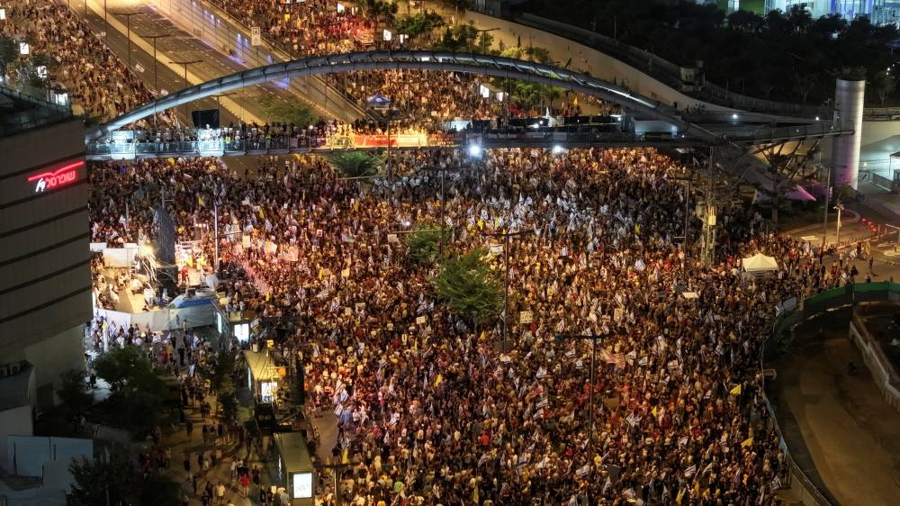 People attend a protest against the Israeli government and to show support for the hostages who were kidnapped during the deadly October 7 attack in Tel Aviv on Saturday. REUTERS