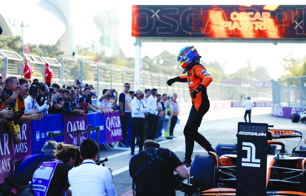 Oscar Piastri celebrates after winning the race. (Reuters)