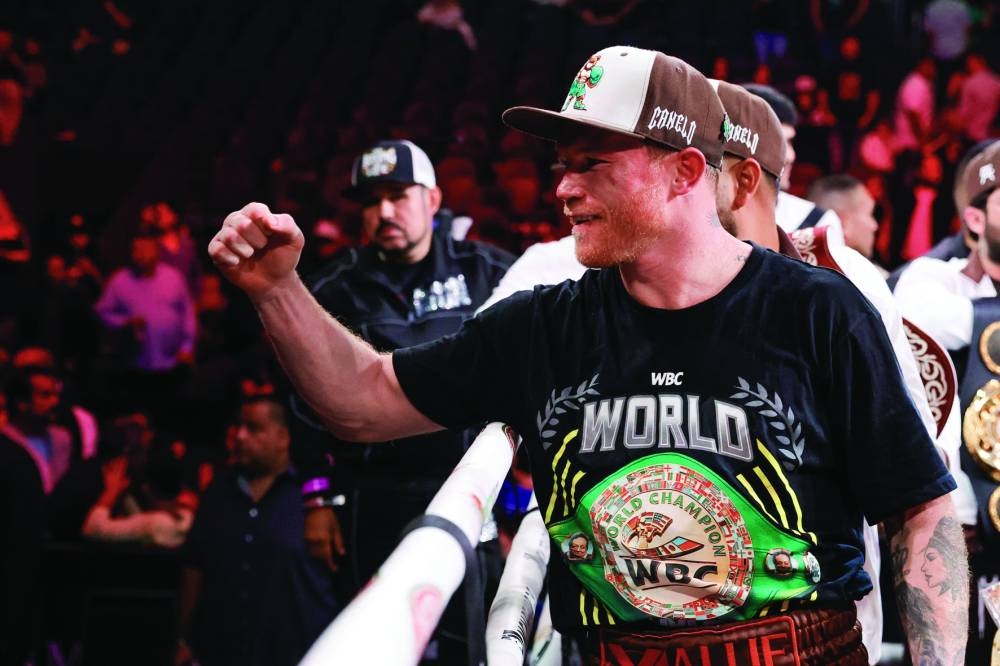 WBC/WBA/WBO super middleweight champion Canelo Alvarez reacts after he won a title fight by unanimous decision against Edgar Berlanga, not pictured, at T-Mobile Arena in Las Vegas, Nevada. (AFP)