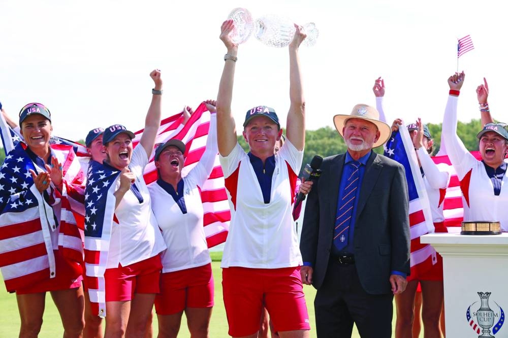 
United States captain Stacy Lewis celebrates after winning the Solheim Cup in Gainesville, Virginia. (AFP) 