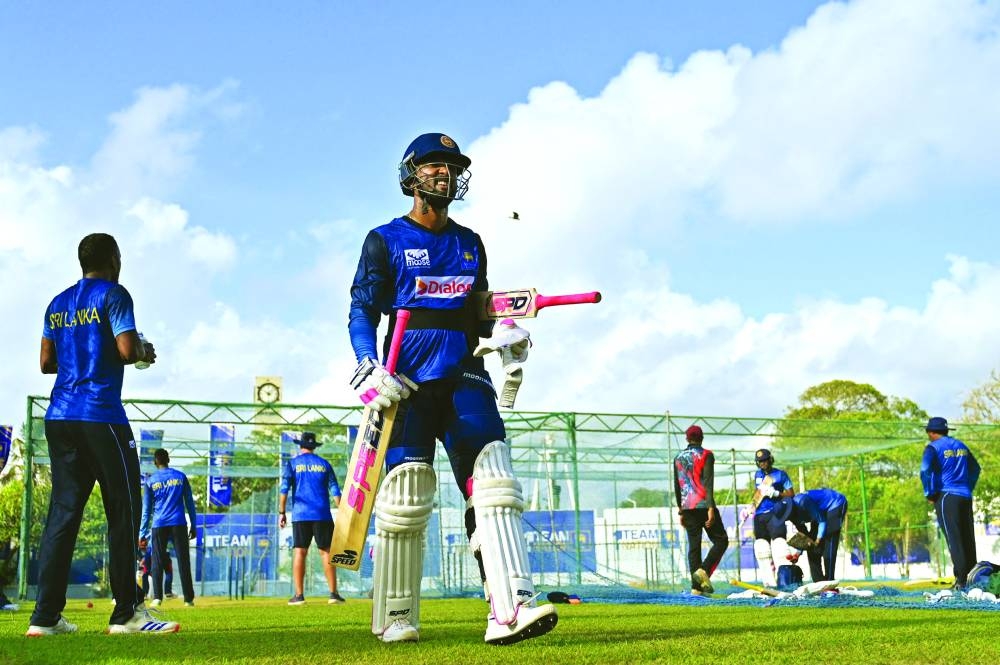 
Sri Lanka’s Dinesh Chandimal (centre) attends a practice session at the Galle International Cricket Stadium in Galle ahead of their first Test against New Zealand. (AFP) 
