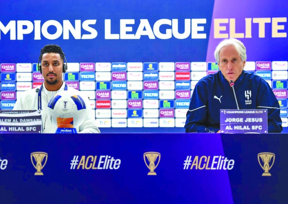 Al Hilal coach Jorge Jesus and player Salem al-Dawsari attend a news conference at Ahmad Bin Ali Stadium in Al Rayyan on Monday. 
Pic: Noushad Thekkayil