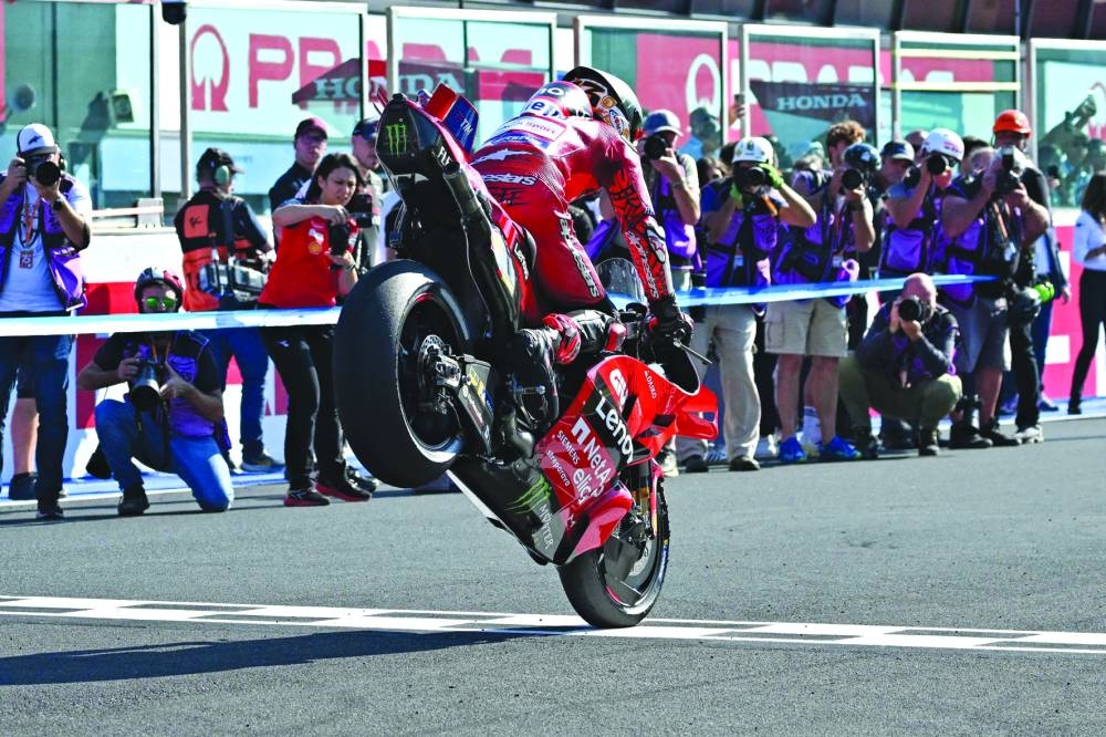 Ducati Italian rider Francesco Bagnaia crosses the finish line of the sprint race of the Emilia-Romagna MotoGP Grand Prix at the Misano World Circuit Marco-Simoncelli in Misano Adriatico, on Saturday. (AFP)