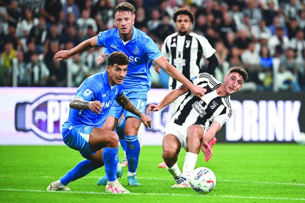 
Juventus’ Andrea Cambiaso (right) fights for the ball with Napoli’s Amir Rrahmani (centre) and Giovanni Di Lorenzo during the Italian Serie A match in Turin. (AFP) 