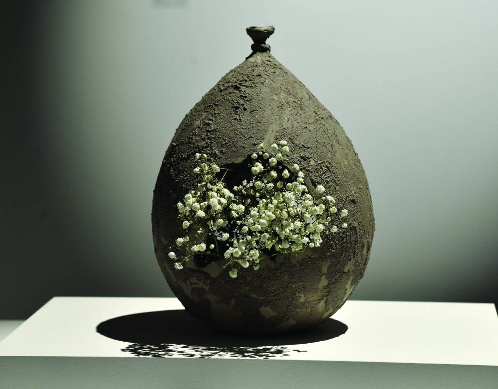 Hayat El-Yamani's pieces: the balloon represents fragility while the clay means the resilience from which humans were formed.