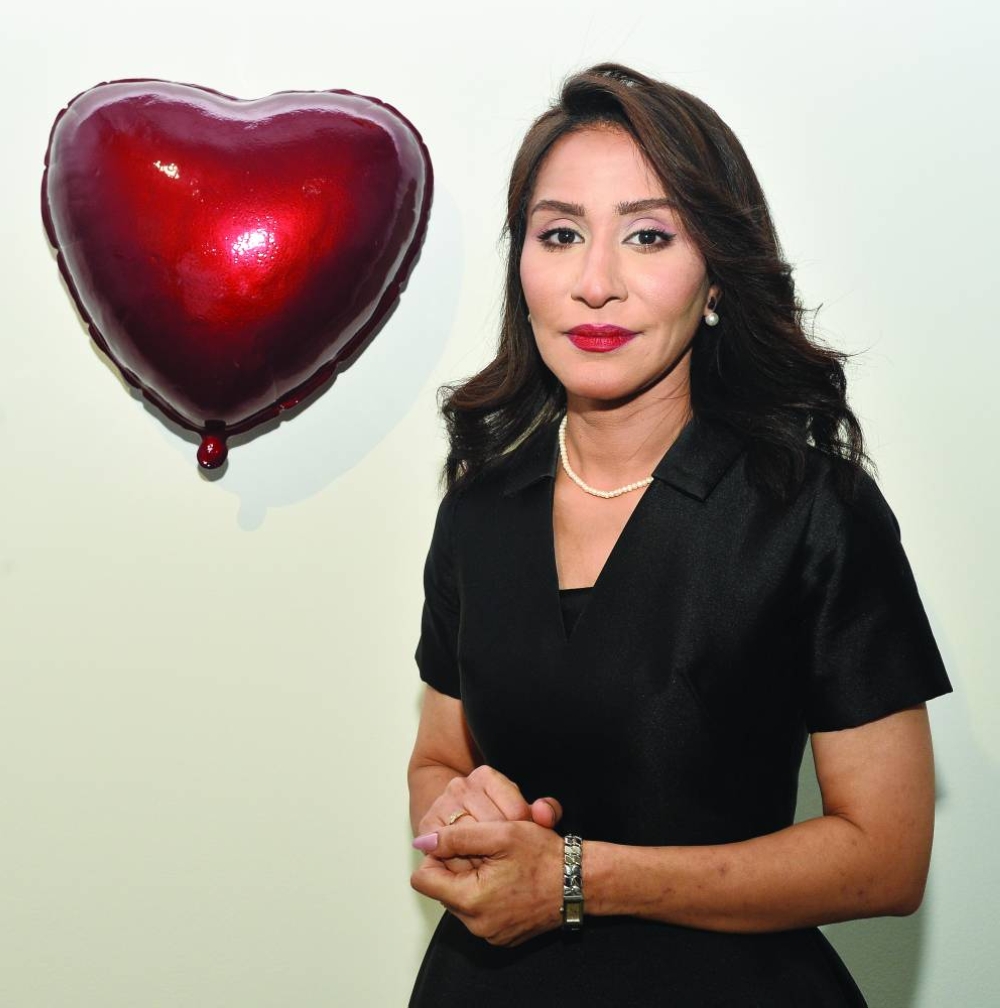 Hayat El-Yamani showcases her artworks.