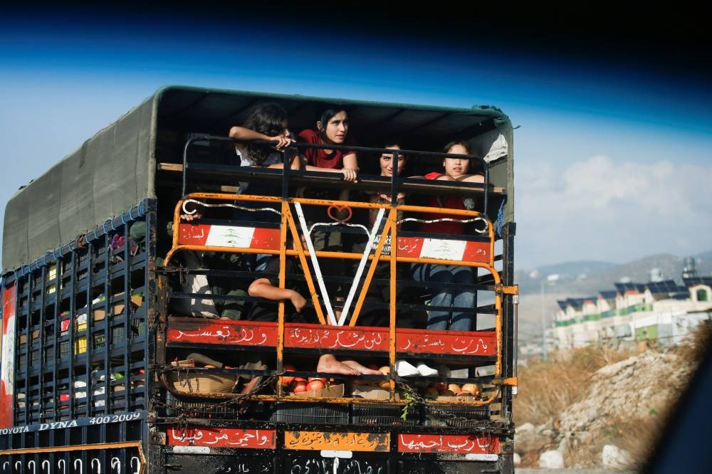 People in heavy traffic drive north from Lebanon's southern coastal city Sidon as some of them flee Israeli bombardment, in Lebanon on Monday. REUTERS