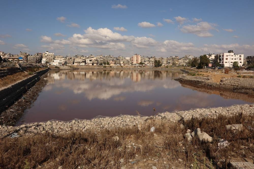 An open air septic pool, filled with wastewater, in the Sheikh Radwan neighbourhood in Gaza City, on Monday. AFP