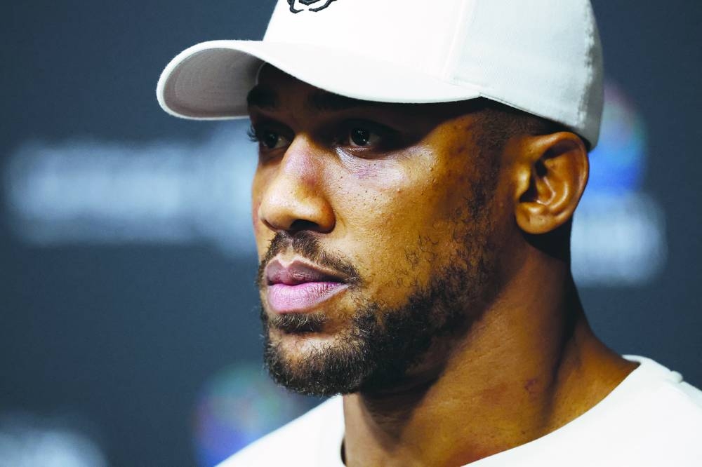 Anthony Joshua during the press conference after losing his fight against Daniel Dubois. (Action Images via Reuters)