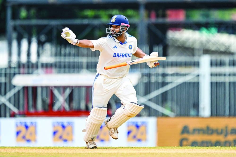 India's Rishabh Pant gestures as he runs between the wickets during the third day of the first Test cricket match between India and Bangladesh at the M.A. Chidambaram Stadium in Chennai on September 21, 2024. (AFP)