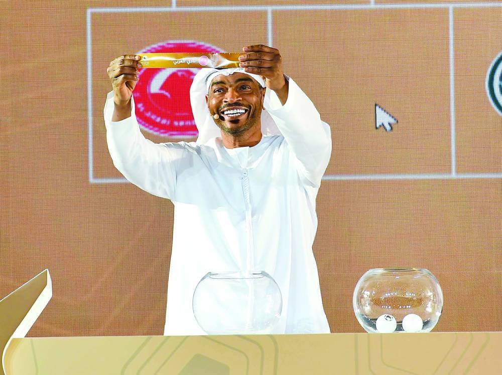 A member of the organising committee conducts the draw.  Picture: Noushad Thekkayil