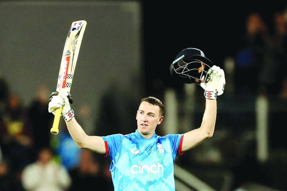 England’s Harry Brook celebrates his century during the third One Day International against Australia at Chester-le-Street in Durham on Tuesday. (AFP)