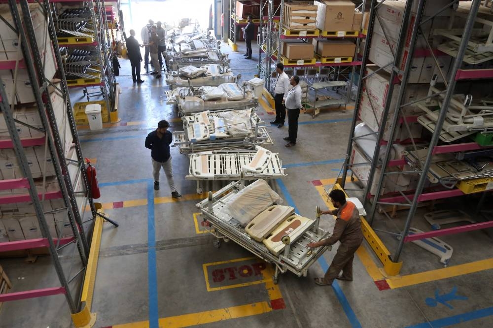 Beds and other medical equipment are prepared at the a warehouse of a religious organisation in Karbala to be sent to Lebanon for the establishment of a field hospital on Wednesday. AFP