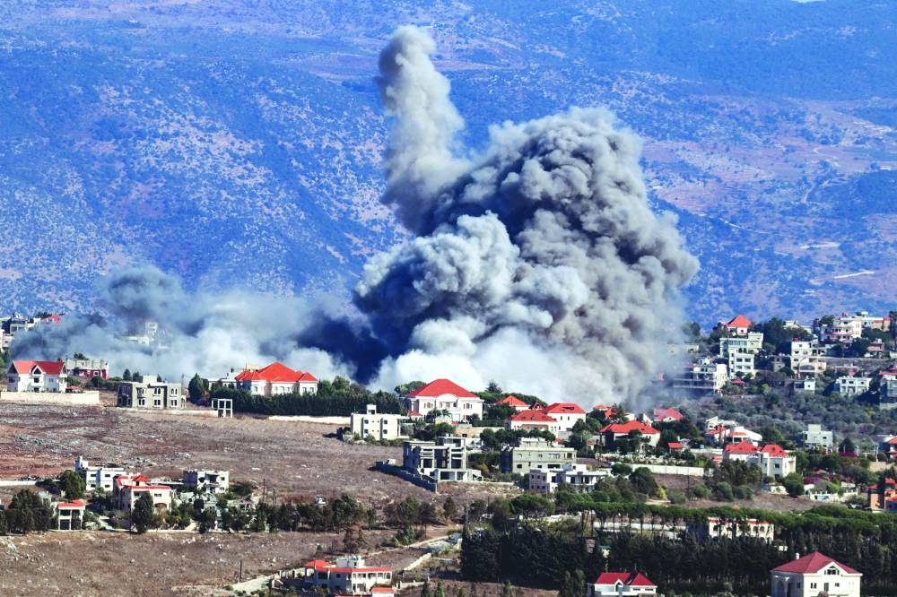 Smoke rises from the site of an Israeli airstrike that targeted the southern Lebanese village of Khiam Wednesday.