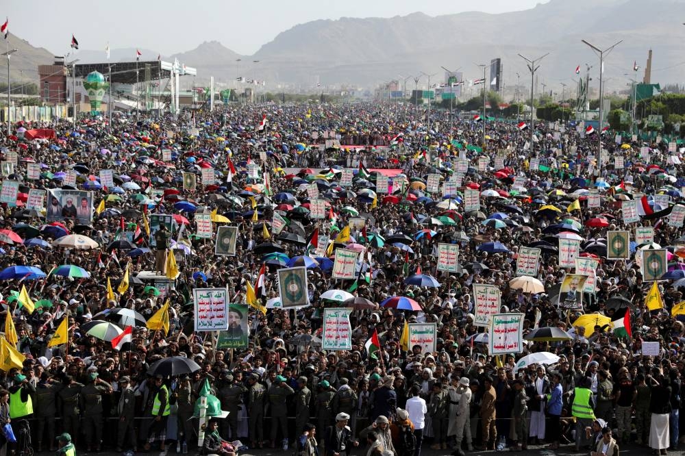 Protesters, mainly Houthi supporters, rally to show support to Palestinians in the Gaza Strip and Lebanon's Hezbollah, in Sanaa, Yemen, on Friday. REUTERS