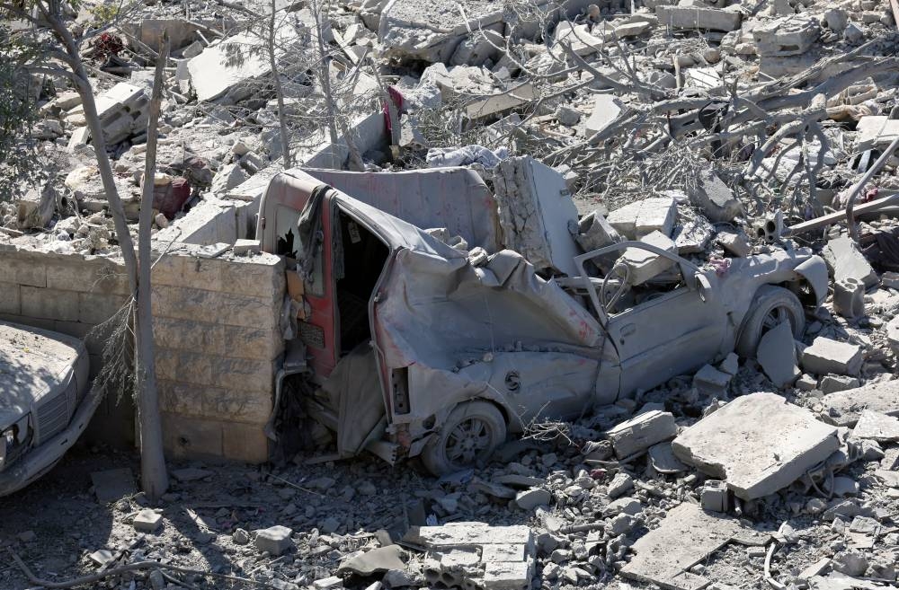 A view shows damage at the site of Israeli strike in Saksakiyeh, southern Lebanon, on Friday. REUTERS