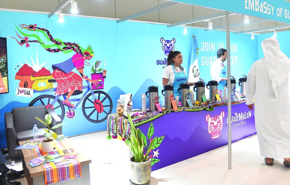 Visitors get a chance to taste the coffee being served by baristas.