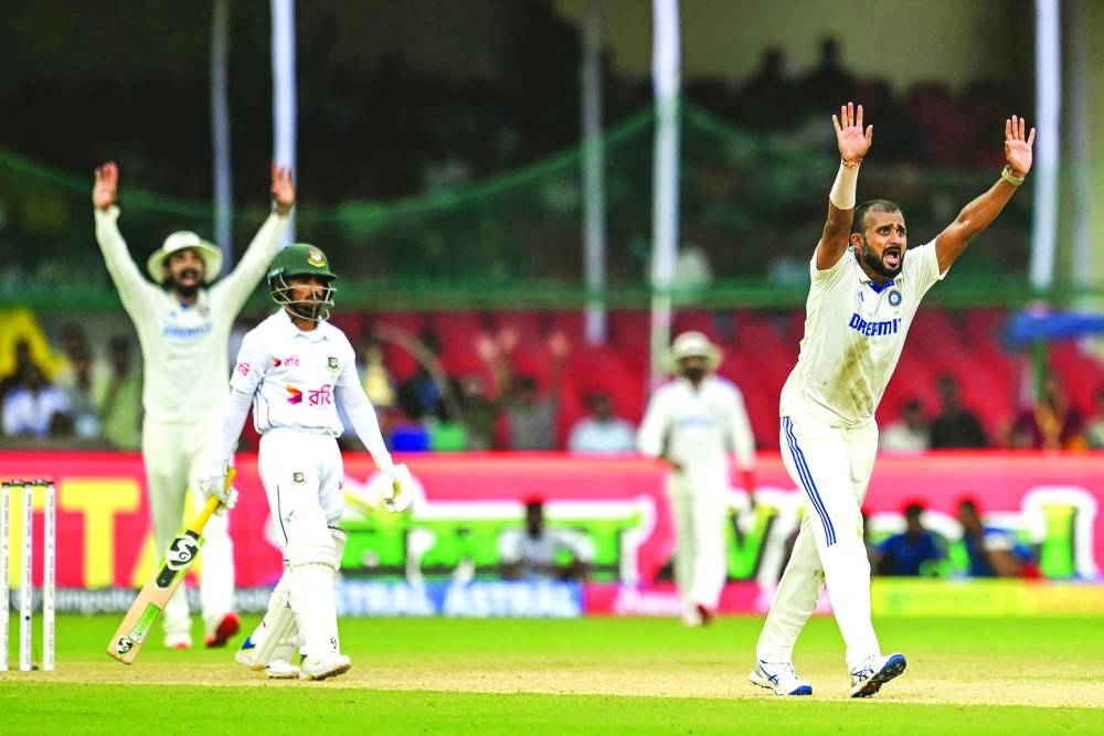 India’s Akash Deep (right) appeals for a leg before wicket decision against Bangladesh’s Mominul Haque during the first day of the second Test at the Green Park Cricket Stadium in Kanpur on Friday. (AFP)