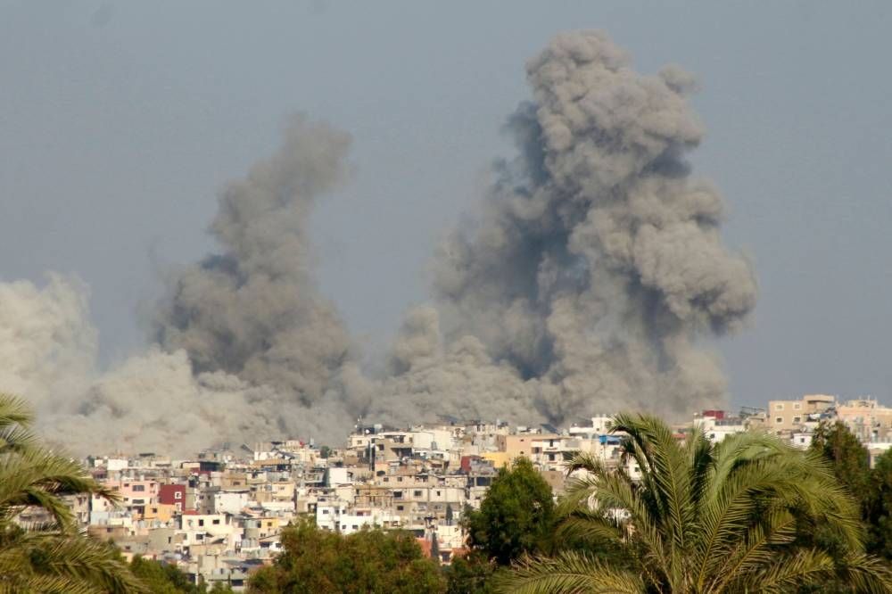 Smoke billows after an Israeli strike on a village near the southern Lebanese city of Tyre on Sunday. AFP