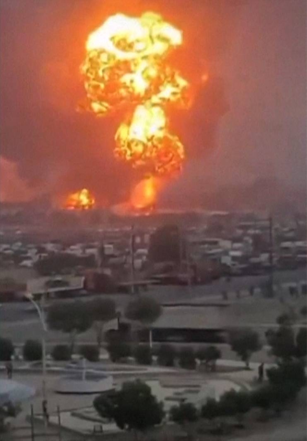 An image grab taken from a video posted on social media Sunday, shows smoke billowing above Yemen's rebel-held Hodeida port city following Israeli strikes.