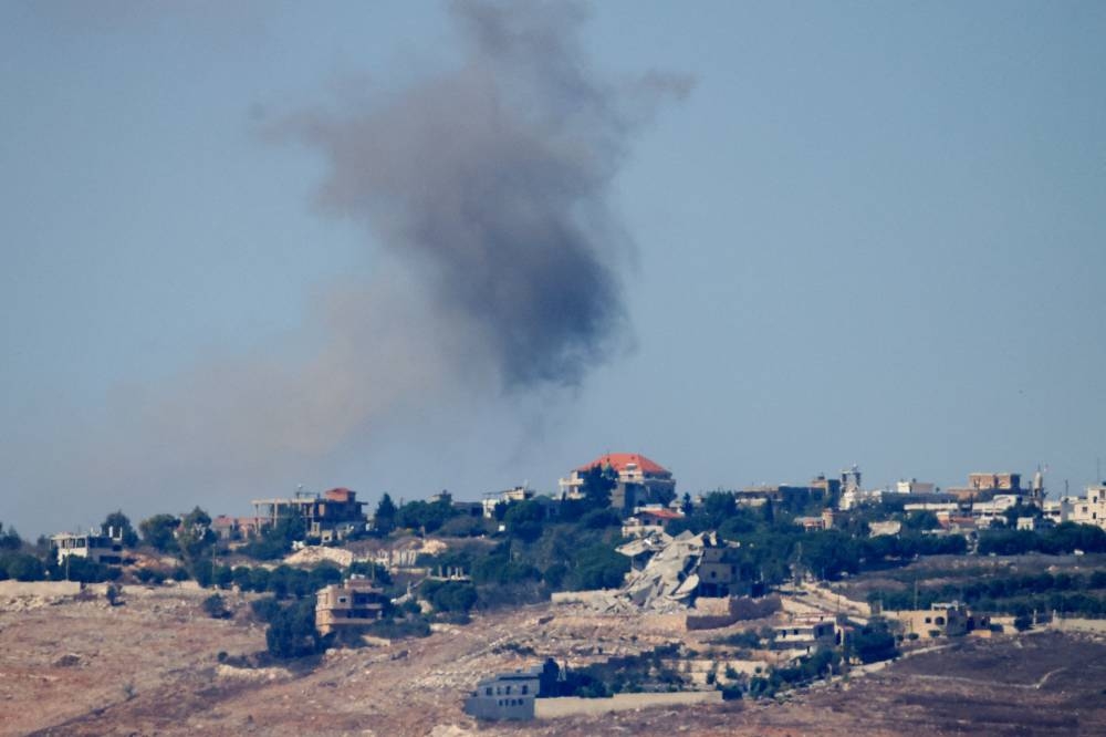 Smoke billows after Israeli Air Force air strikes in southern Lebanon villages, amid cross-border hostilities between Hezbollah and Israel, as seen from northern Israel, on Monday. REUTERS