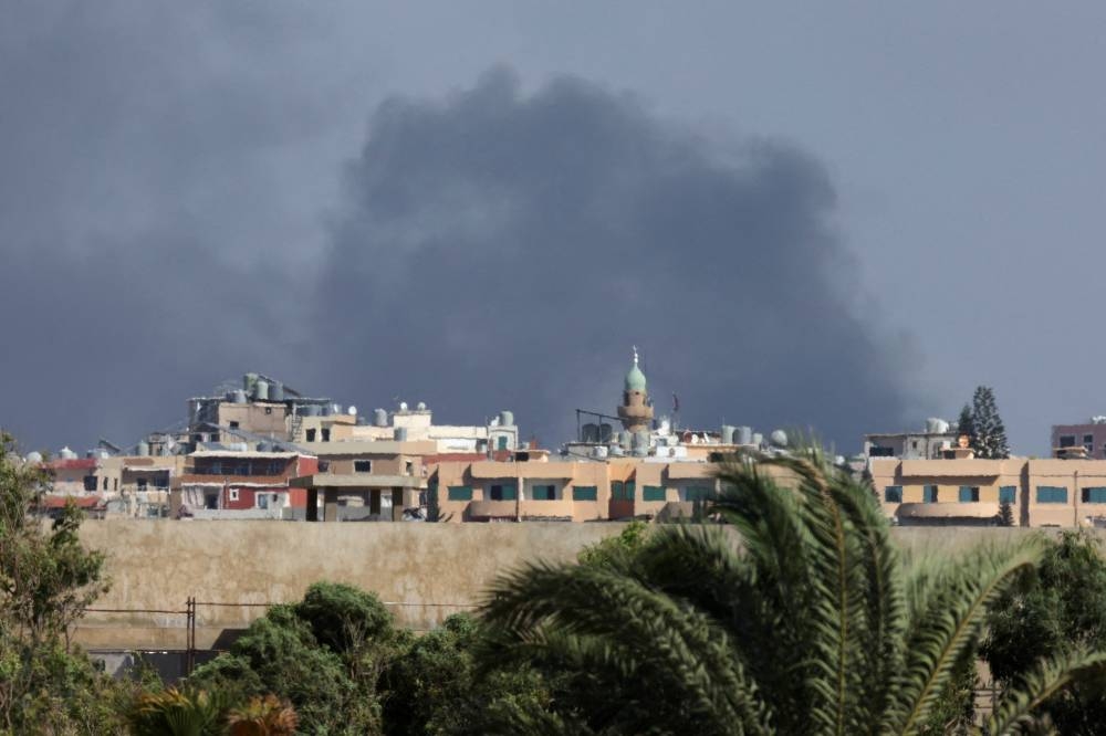 Smoke billows amid ongoing hostilities between Hezbollah and Israeli forces, as seen from Tyre, southern Lebanon, on Tuesday. REUTERS
