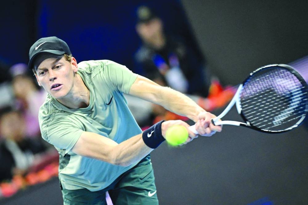 Italy’s Jannik Sinner returns against China’s Bu Yunchaokete during their semi-final at the China Open in Beijing on Tuesday. (AFP)
