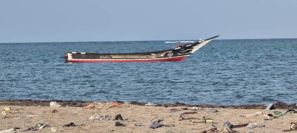 A view of an anchored boat after bodies of suspected migrants who died after their boat capsized were retrieved off the coast of Djibouti on Wednesday. Mohamed Ibrahim/International Organization for Migration/Handout via REUTERS