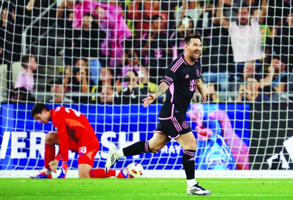 
Inter Miami CF forward Lionel Messi celebrates after scoring his second goal against the Columbus Crew during the first half at Lower.com Field. 