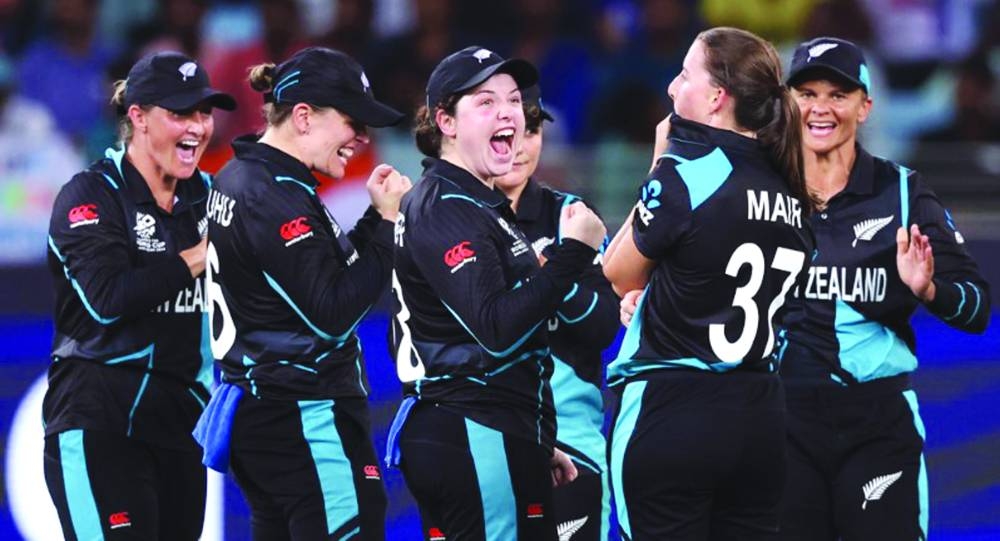 New Zealand players celebrate beating India in their ICC Women’s T20 World Cup match in Dubai on Friday. (@WHITE_FERNS)