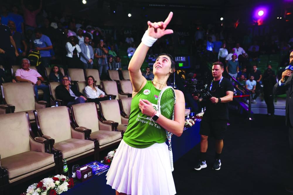 Nour El Sherbini celebrates after beating Hania El Hammamy at the Khalifa International Tennis & Squash Complex in Doha on Friday.