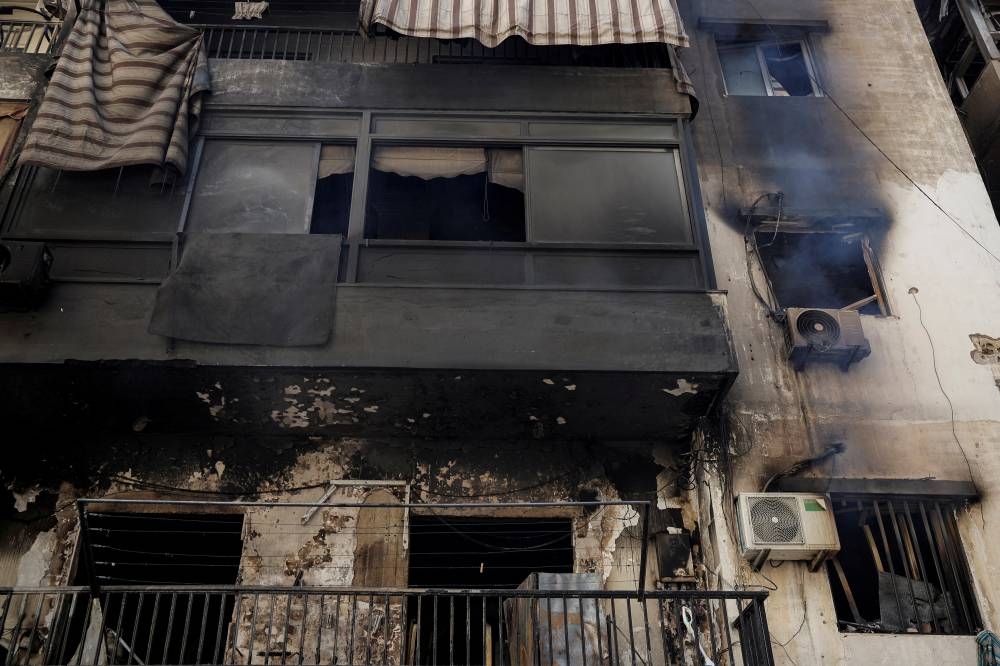 A view of a damaged building in the aftermath of the Israeli strikes in the Chiyah area of Dahiyeh, Beirut, on Saturday. REUTERS