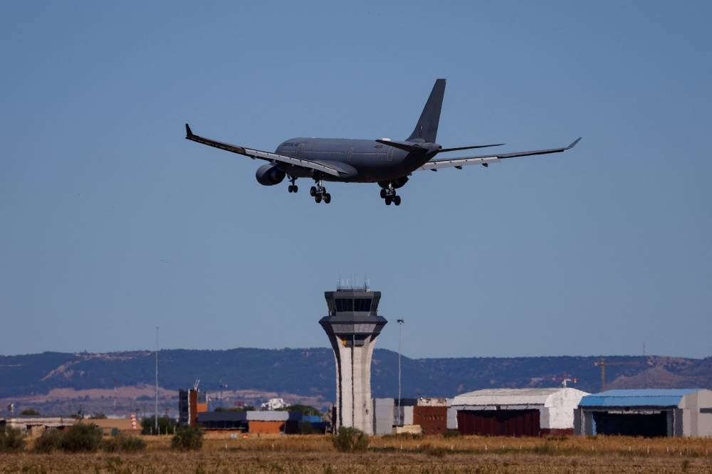Spanish, Spanish-Lebanese and Lebanese nationals evacuated from Lebanon arrive in a Spanish military airplane at the Torrejon de Ardoz Air Force Base outside Madrid, Spain, on Thursday. REUTERS