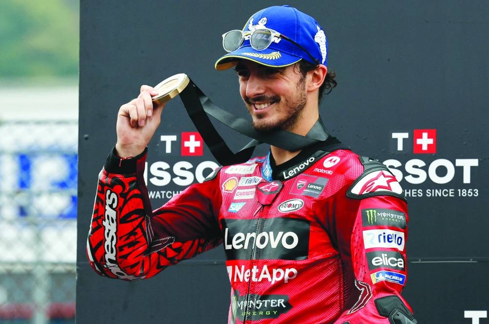 
Ducati’s Francesco Bagnaia celebrates winning the sprint race. (Reuters) 