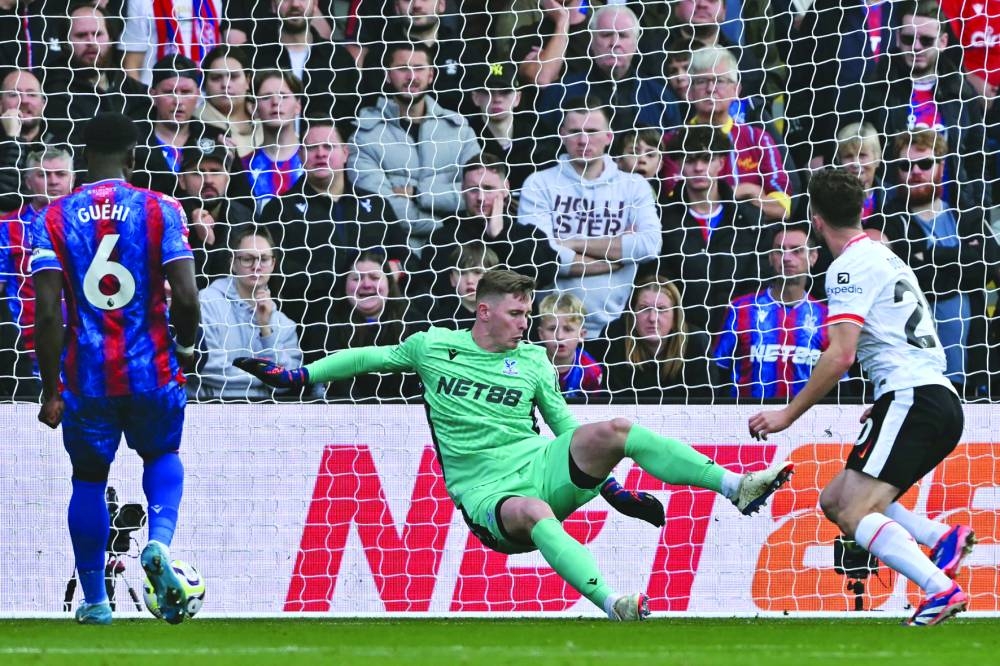 
Liverpool’s Diogo Jota (right) scores past Crystal Palace’s goalkeeper Dean Henderson during the Premier League match in London. (AFP) 