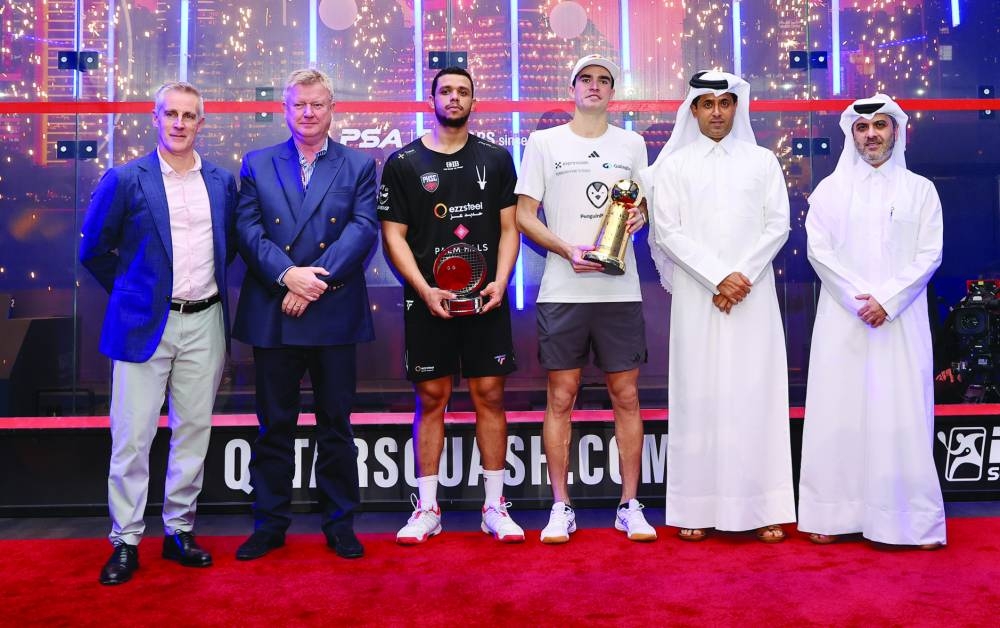 
Qatar Classic men’s winner Diego Elias of Peru and runner-up Mostafa Asal of Egypt pose with Qatar Tennis, Squash and Badminton Federation President Nasser bin Ghanim al-Khelaifi, Secretary-General Tareq Zainal and CEO of Professional Squash Association Alex Gough. 