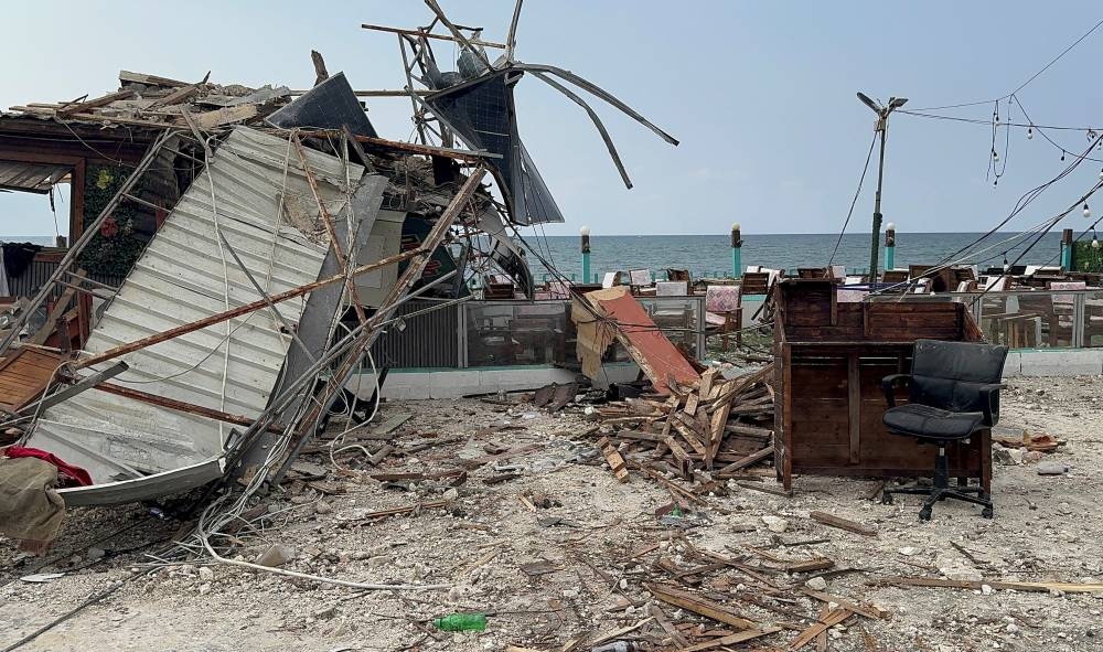 A view shows damage at the corniche area of Ghaziyeh, Lebanon, on Sunday. REUTERS