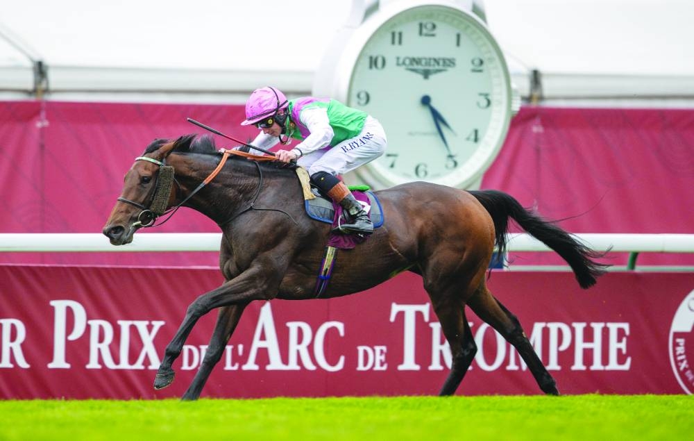 
Bluestocking ridden by Irish jockey Rossa Ryan crosses the finish line to win the Qatar Prix de l’Arc de Triomphe flat race at the ParisLongchamp racecourse in Paris. 