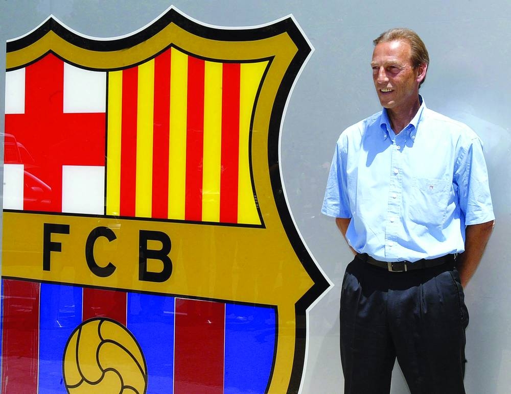 Johan Neeskens poses for a picture during his official presentation in Barcelona’s Camp Nuo Stadium on June 13, 2006. Neeskens, part of the Ajax and Netherlands teams that created “total football” in the 1970s and a key teammate of Johan Cruyff, has died aged 73, the Dutch football federation said on Monday. (AFP)
