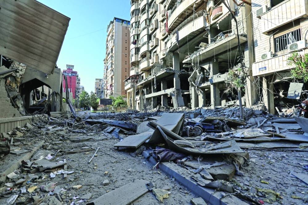 A view shows a damaged site in the aftermath of Israeli strikes on Beirut's southern suburbs, Tuesday.