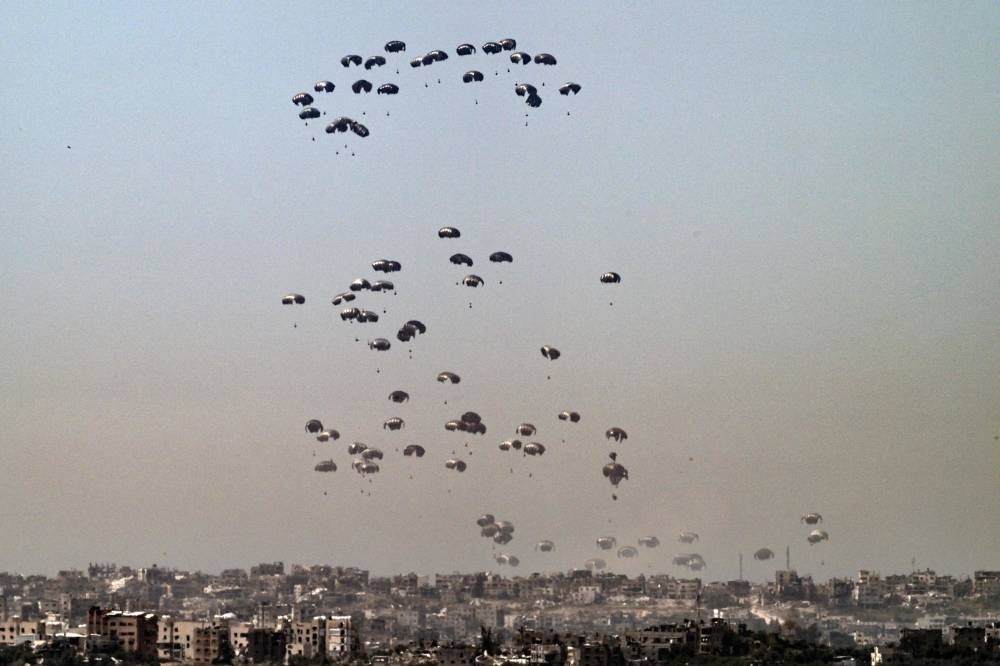Humanitarian aid being airdropped over the besieged Palestinian territory on April 2, 2024. File picture: AFP