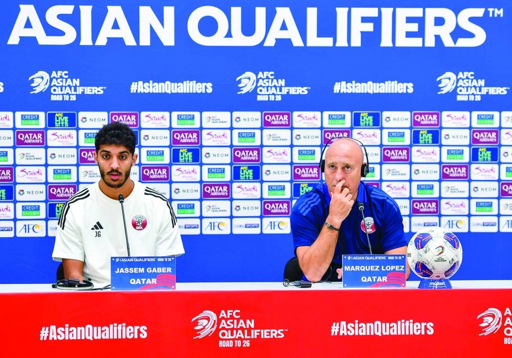 Qatar coach Marquez Lopez and player Jassem Gaber during a pre-match press conference in Doha on Wednesday.  PICTURE: Noushad Thekkayil
